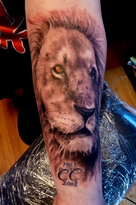 Mully - lion on forearm
